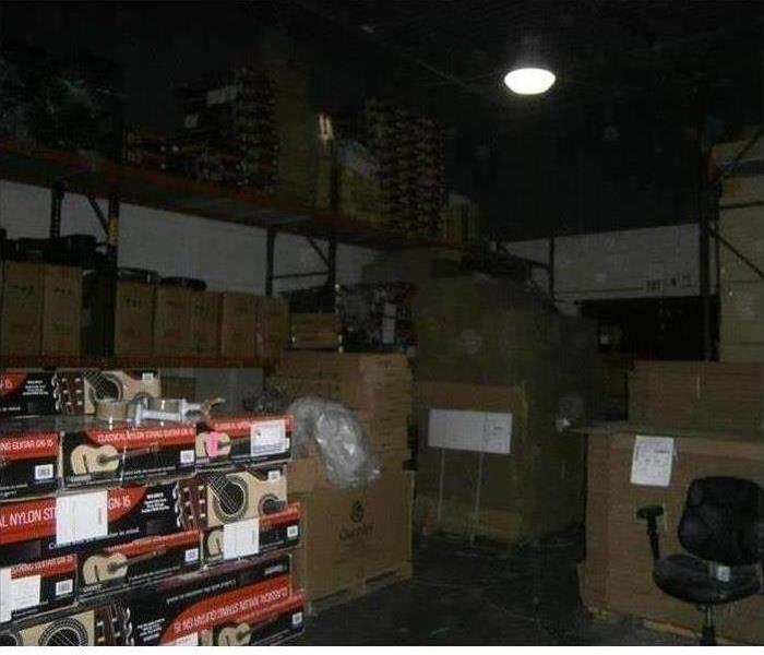 boxes stacked up with soot on them 